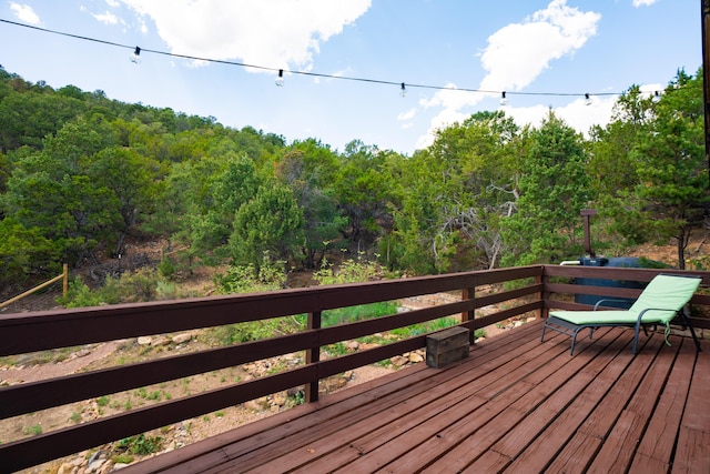 23 Cooper Rd, Cedar Crest, NM 87008 - wooden deck featuring a wooded view