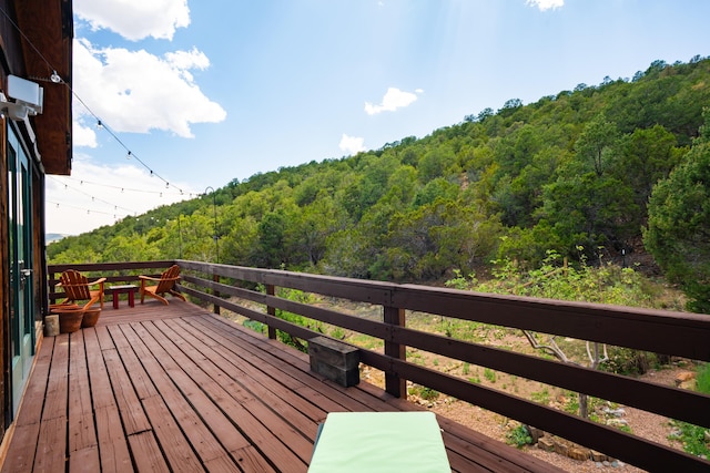 23 Cooper Rd, Cedar Crest, NM 87008 - wooden terrace with a view of trees