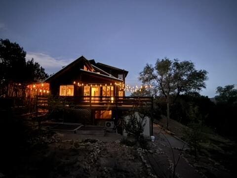 23 Cooper Rd, Cedar Crest, NM 87008 - rear view of house with a deck and a patio area