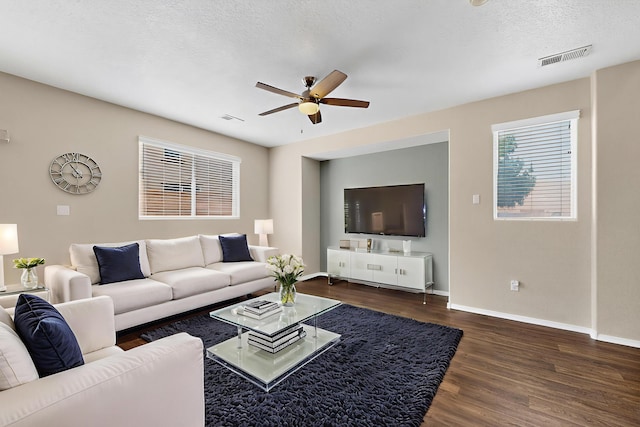 2353 Cortina Loop SE, Rio Rancho, NM 87124 - living area with a ceiling fan, wood finished floors, and a textured ceiling