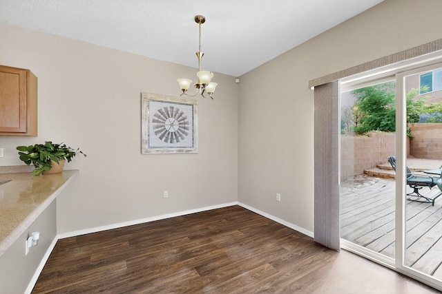 2353 Cortina Loop SE, Rio Rancho, NM 87124 - unfurnished dining area with wood finished floors and a chandelier