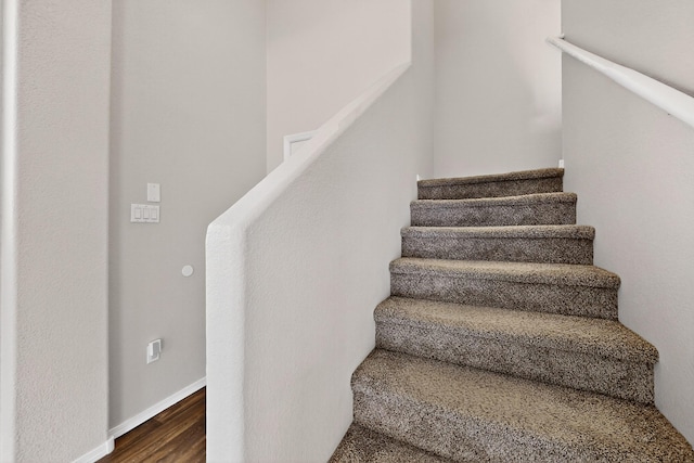 2353 Cortina Loop SE, Rio Rancho, NM 87124 - staircase featuring wood finished floors and baseboards