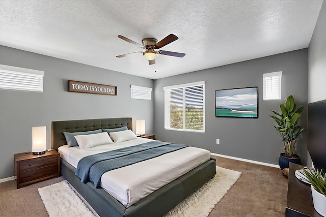2353 Cortina Loop SE, Rio Rancho, NM 87124 - carpeted bedroom with ceiling fan and a textured ceiling