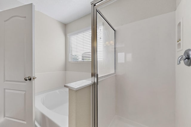2353 Cortina Loop SE, Rio Rancho, NM 87124 - bathroom featuring a shower stall and a garden tub