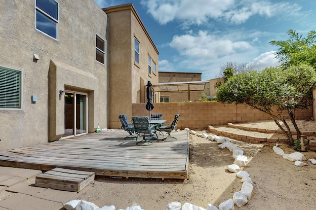 2353 Cortina Loop SE, Rio Rancho, NM 87124 - view of yard with a wooden deck and outdoor dining area
