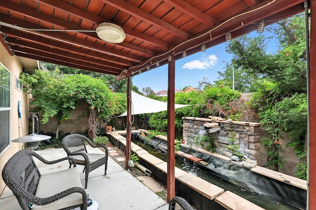 8500 Clarks Fork Rd NW, Albuquerque, NM 87120 - fenced backyard with a patio area