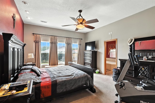 8500 Clarks Fork Rd NW, Albuquerque, NM 87120 - carpeted bedroom with a textured ceiling, ensuite bath, and a ceiling fan