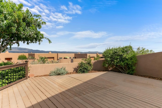 31 Wind Rd NW, Albuquerque, NM 87120 - wooden terrace with a mountain view