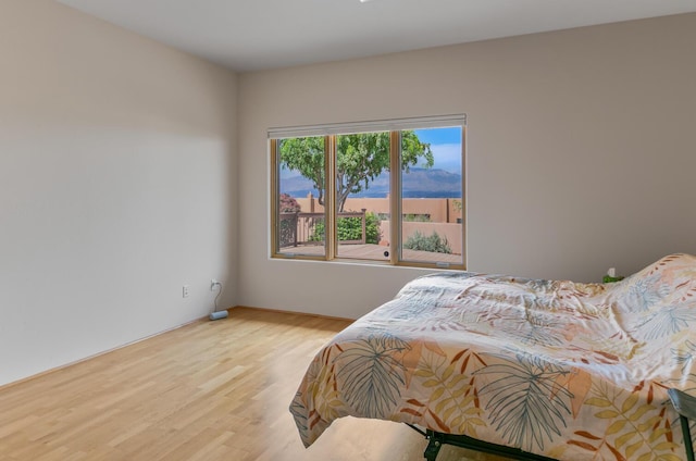 31 Wind Rd NW, Albuquerque, NM 87120 - bedroom featuring wood finished floors