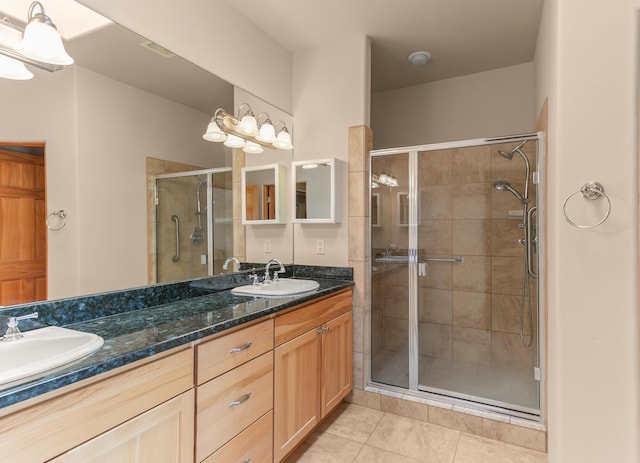 31 Wind Rd NW, Albuquerque, NM 87120 - full bath featuring a shower stall, double vanity, and tile patterned flooring