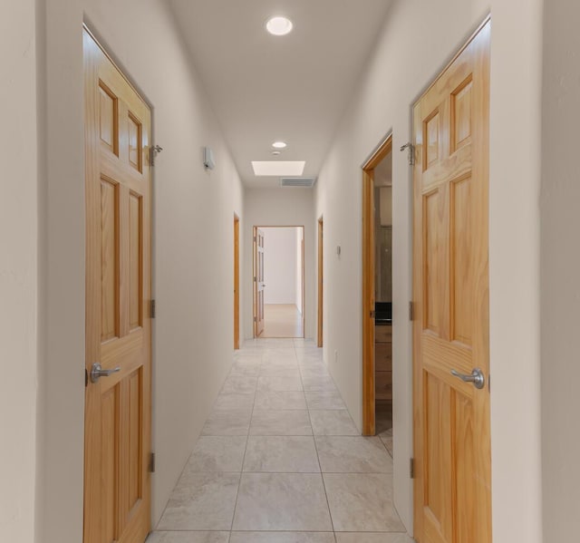31 Wind Rd NW, Albuquerque, NM 87120 - hall with recessed lighting and light tile patterned floors