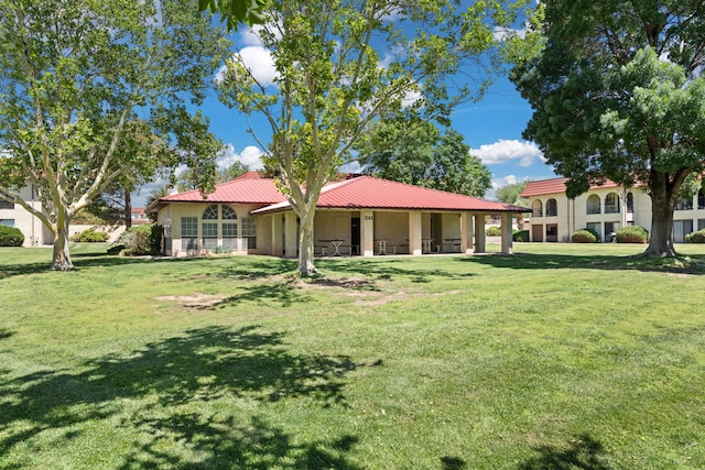 805 Country Club Dr SE Unit G2, Rio Rancho, NM 87124 - view of front of house featuring a front lawn and a metal roof