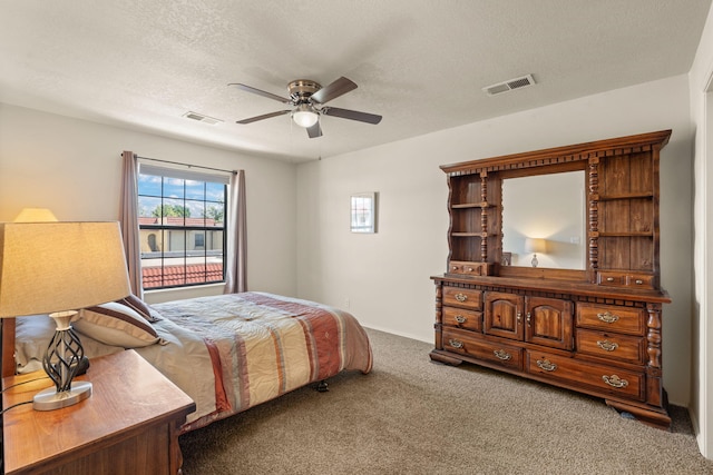 805 Country Club Dr SE Unit G2, Rio Rancho, NM 87124 - bedroom with carpet floors, a textured ceiling, and a ceiling fan