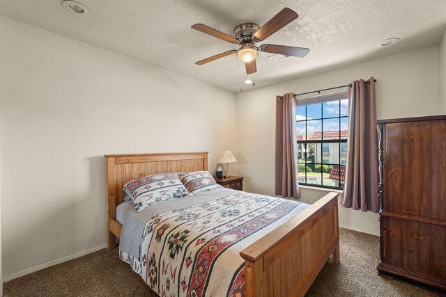 805 Country Club Dr SE Unit G2, Rio Rancho, NM 87124 - carpeted bedroom with ceiling fan, recessed lighting, and a textured ceiling