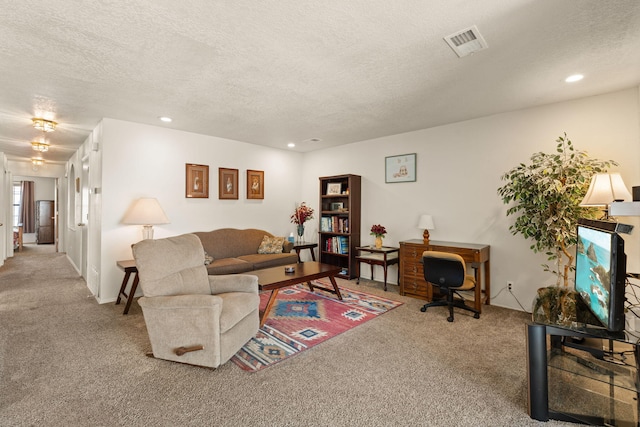 805 Country Club Dr SE Unit G2, Rio Rancho, NM 87124 - carpeted living area featuring a textured ceiling, recessed lighting, and a desk