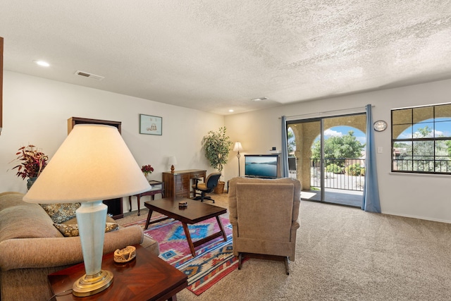 805 Country Club Dr SE Unit G2, Rio Rancho, NM 87124 - living area with a textured ceiling, carpet flooring, and recessed lighting