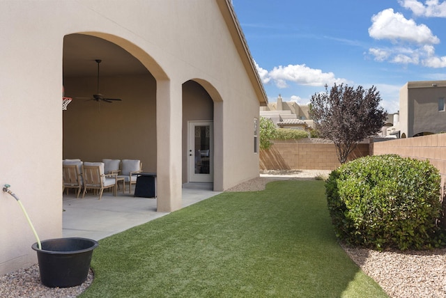 9844 Cameron St NW, Albuquerque, NM 87114 - view of yard featuring a patio area and a ceiling fan