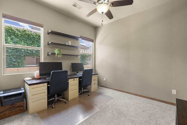 9844 Cameron St NW, Albuquerque, NM 87114 - home office with a ceiling fan and light colored carpet