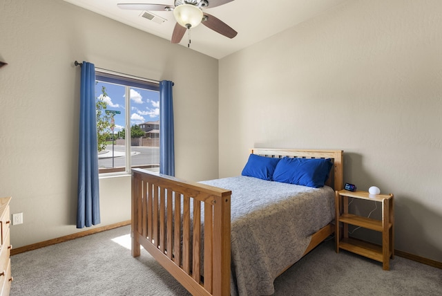 9844 Cameron St NW, Albuquerque, NM 87114 - carpeted bedroom featuring ceiling fan and baseboards