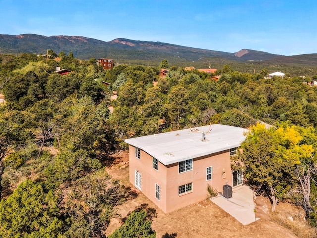 40 Mulberry Loop, Cedar Crest, NM 87008 - aerial view of property and surrounding area with a mountainous background and a heavily wooded area