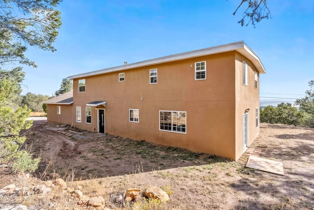 40 Mulberry Loop, Cedar Crest, NM 87008 - back of property featuring stucco siding