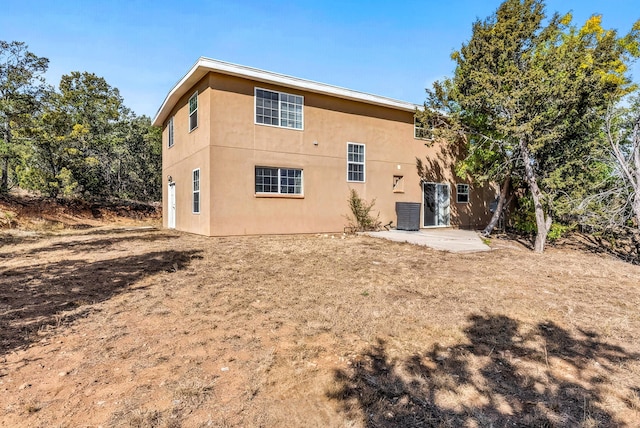 40 Mulberry Loop, Cedar Crest, NM 87008 - back of property with stucco siding and a patio