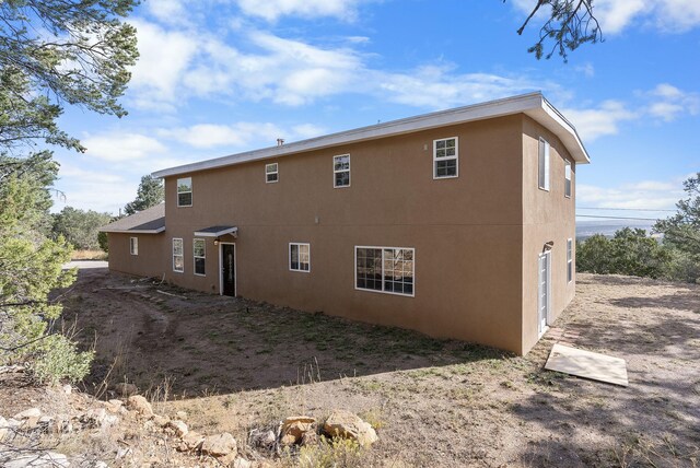 40 Mulberry Loop, Cedar Crest, NM 87008 - back of house with stucco siding