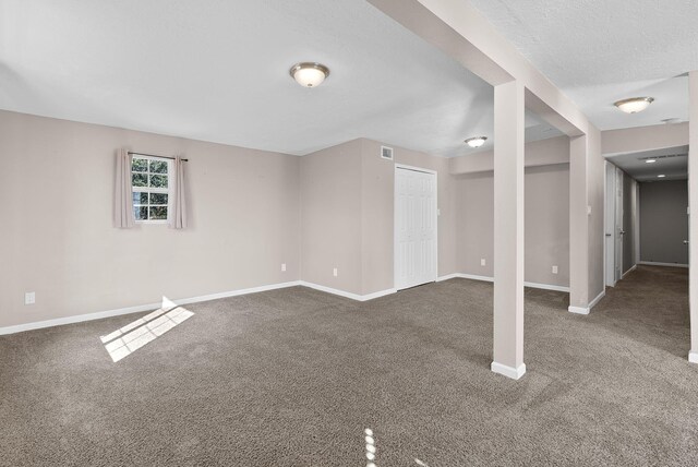 40 Mulberry Loop, Cedar Crest, NM 87008 - unfurnished living room featuring dark colored carpet