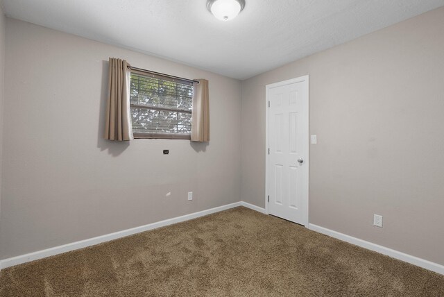 40 Mulberry Loop, Cedar Crest, NM 87008 - carpeted empty room featuring baseboards