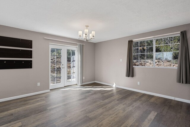 40 Mulberry Loop, Cedar Crest, NM 87008 - empty room featuring a chandelier, wood finished floors, and a textured ceiling
