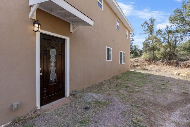 40 Mulberry Loop, Cedar Crest, NM 87008 - property entrance featuring stucco siding