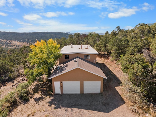 40 Mulberry Loop, Cedar Crest, NM 87008 - view from above of property with a forest and a mountain backdrop