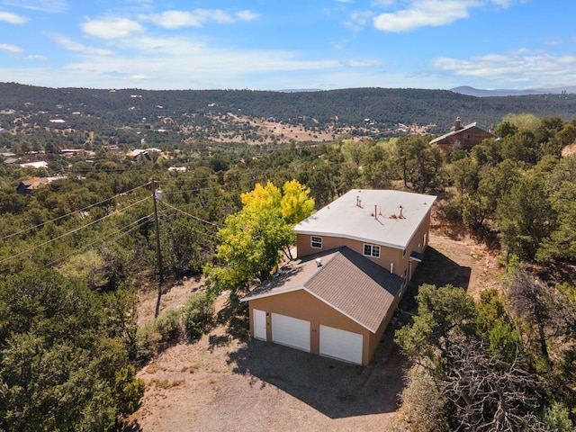 40 Mulberry Loop, Cedar Crest, NM 87008 - aerial view of property and surrounding area featuring a mountainous background and a heavily wooded area