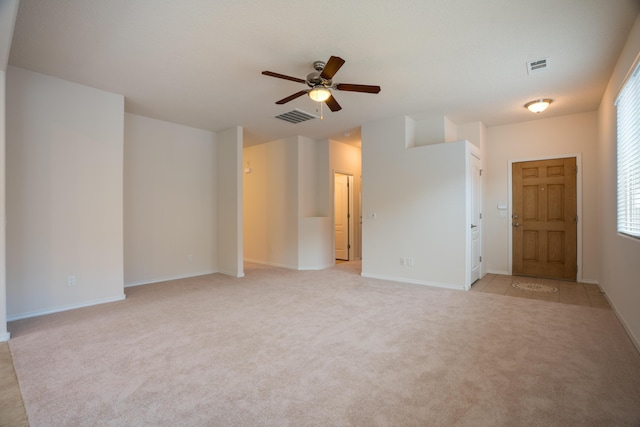 827 Purple Aster Dr, Bernalillo, NM 87004 - empty room with light colored carpet and ceiling fan