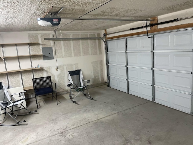 45 Juniper Ave, Los Lunas, NM 87031 - garage featuring a garage door opener and electric panel