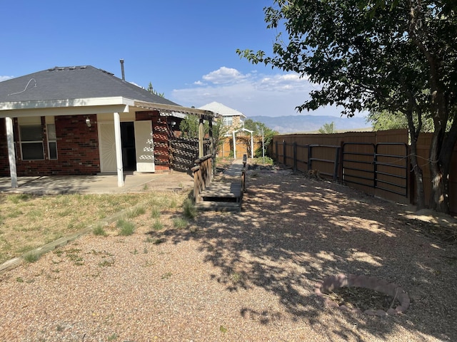 45 Juniper Ave, Los Lunas, NM 87031 - view of yard with a patio area