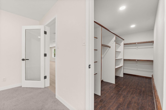 697 W W Meadowlark Ln, Corrales, NM 87048 - spacious closet featuring dark wood-style floors