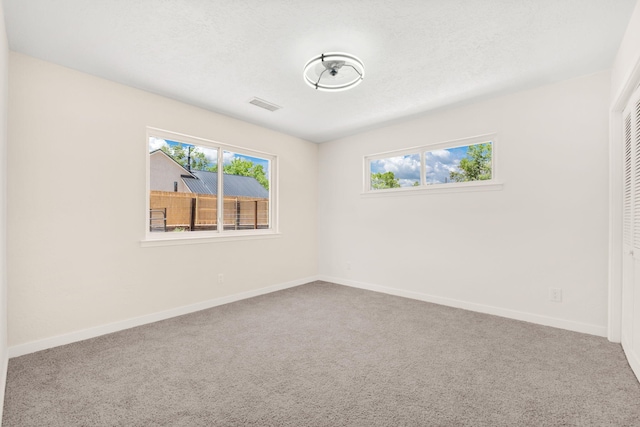 697 W W Meadowlark Ln, Corrales, NM 87048 - unfurnished bedroom featuring carpet flooring and a closet