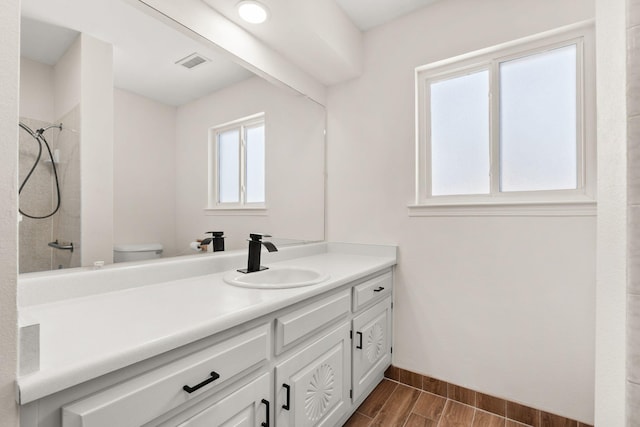 697 W W Meadowlark Ln, Corrales, NM 87048 - full bath featuring vanity, a shower, and wood finish floors