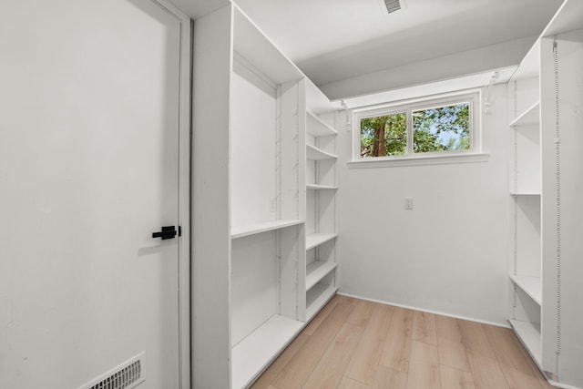 697 W W Meadowlark Ln, Corrales, NM 87048 - spacious closet with light wood-style flooring