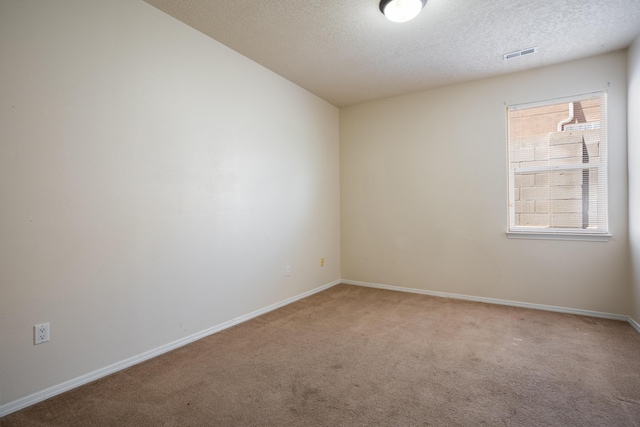 5485 Roosevelt Loop NE, Rio Rancho, NM 87144 - unfurnished room featuring carpet and a textured ceiling