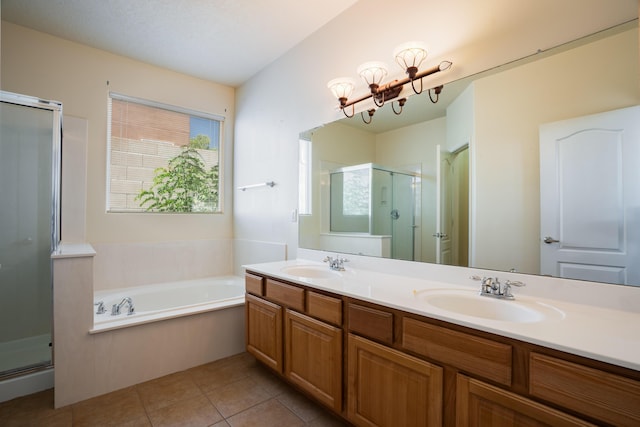 5485 Roosevelt Loop NE, Rio Rancho, NM 87144 - full bathroom featuring a shower stall, double vanity, a garden tub, and tile patterned flooring
