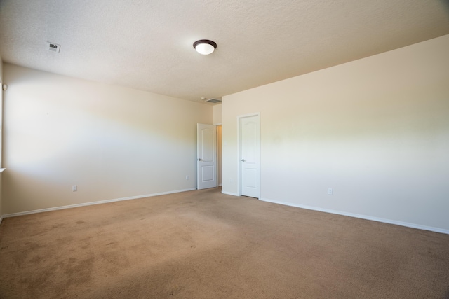 5485 Roosevelt Loop NE, Rio Rancho, NM 87144 - empty room with light colored carpet and a textured ceiling