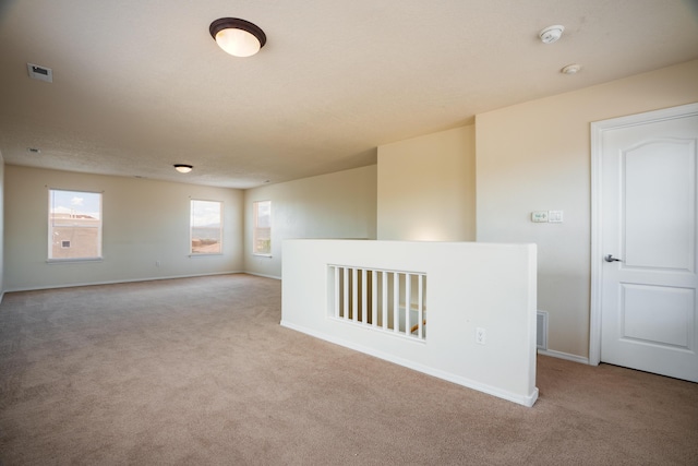 5485 Roosevelt Loop NE, Rio Rancho, NM 87144 - spare room with light carpet and a smoke detector