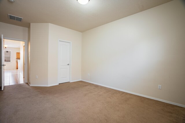 5485 Roosevelt Loop NE, Rio Rancho, NM 87144 - carpeted spare room with baseboards