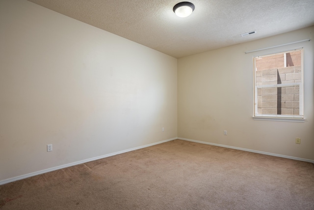 5485 Roosevelt Loop NE, Rio Rancho, NM 87144 - carpeted empty room featuring a textured ceiling and baseboards