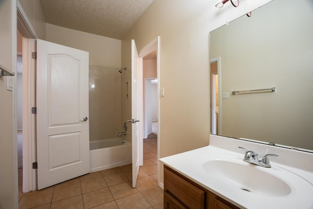 5485 Roosevelt Loop NE, Rio Rancho, NM 87144 - full bathroom with vanity, tile patterned floors, shower / tub combination, and a textured ceiling