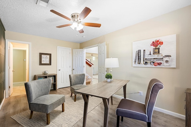 4432 La Paloma Rd NW, Albuquerque, NM 87120 - office featuring a ceiling fan and light wood-style flooring