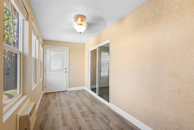 4432 La Paloma Rd NW, Albuquerque, NM 87120 - unfurnished sunroom featuring an AC wall unit