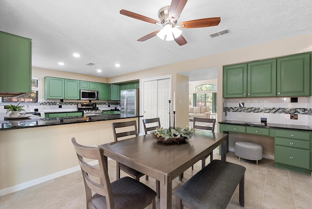 4432 La Paloma Rd NW, Albuquerque, NM 87120 - dining area featuring ceiling fan, a textured ceiling, recessed lighting, and light tile patterned floors
